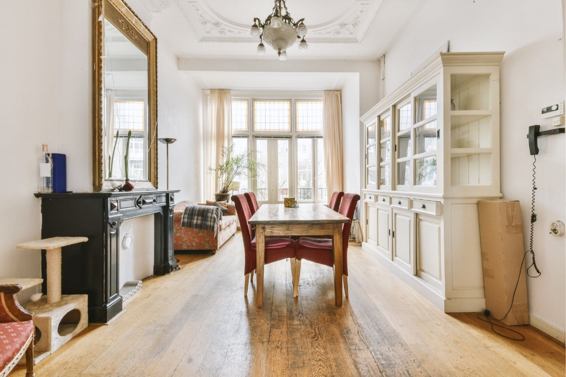 large wall mirror in a dining room